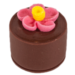 Smooth hazelnut praline in pure couverture milk chocolate shell topped with a sugar flower