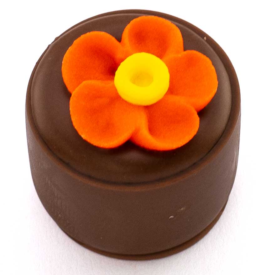 Mango and passionfruit ganache in dark chocolate shell