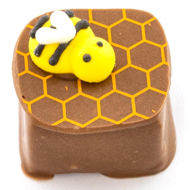 Milk chocolate honey ganache enrobed in pure milk chocolate